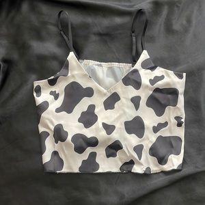 Cow print tank top. NWOT. Size Medium. Satin texture.